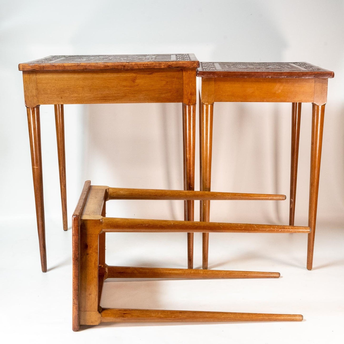 Late 20th Century Leather Wrapped Hand Tooled Peruvian Accent Nesting Tables - Set of 3